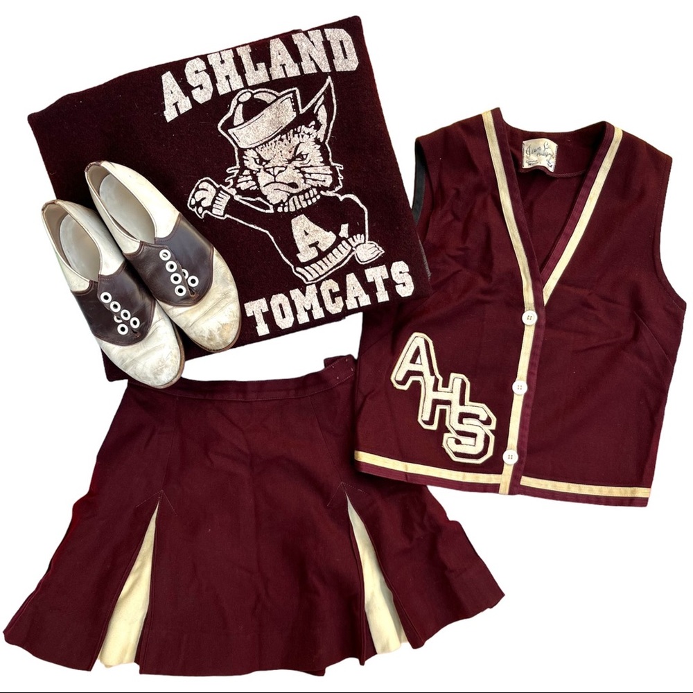 Vintage cheerleader uniform with shoes and blanket